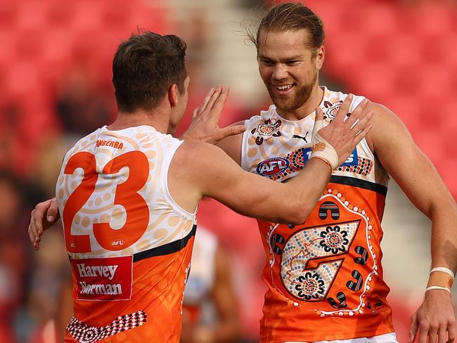 SYDNEY, AUSTRALIA - MAY 22: Harry Himmelberg of the Giants celebrates kicking a goal during the round 10 AFL match between the Greater Western Sydney Giants and the West Coast Eagles at GIANTS Stadium on May 22, 2022 in Sydney, Australia. (Photo by Mark Metcalfe/AFL Photos/Getty Images)