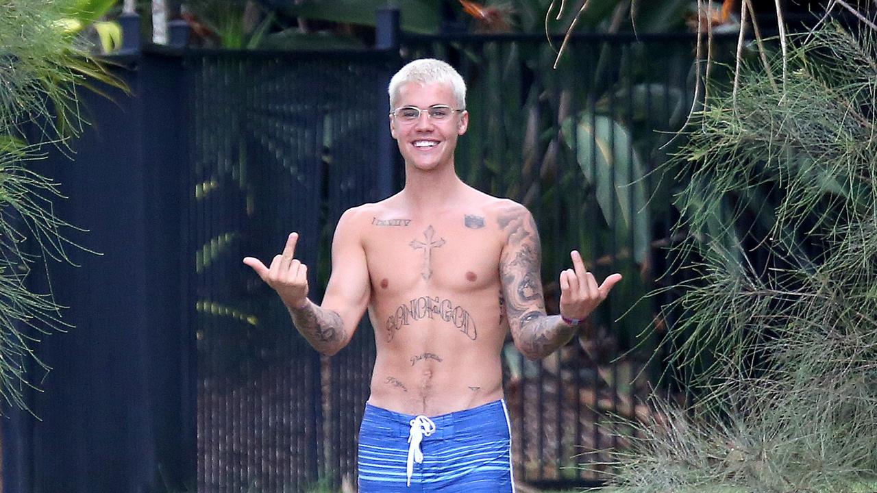 Justin Bieber showing off his muscles while on Make Peace Island in Noosa. Picture: Instar Images