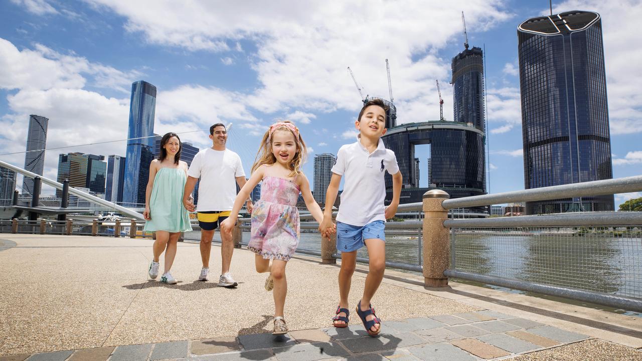 Cherie and Brendan Philip-Kingsley of Toowong at Southbank with children Estella 5, and Nico 10. Picture Lachie Millard