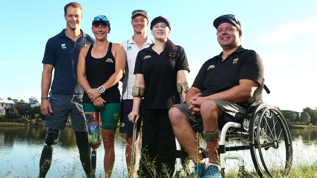 Gold Coast-based Paralympians earlier this year before heading to the world kayaking titles in Germany. From left to right, Curtis McGrath, Amanda Reynolds, coach Andrea King, Susan Seipel and Colin Sieders. Picture: Scott Fletcher.