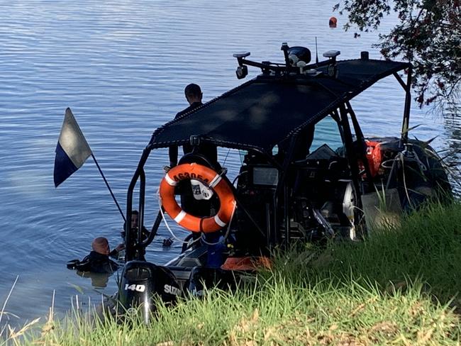 Police divers at Remark, South Australia, looking for missing man Joe. Picture: George Yankovich