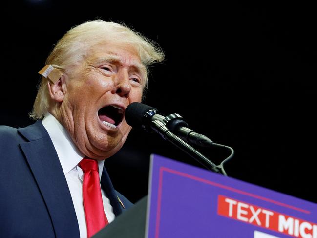 GRAND RAPIDS, MICHIGAN - JULY 20: Republican presidential nominee, former U.S. President Donald Trump speaks during a campaign rally at the Van Andel Arena on July 20, 2024 in Grand Rapids, Michigan. Trump's campaign event is the first joint event with his recent vice presidential pick Sen. JD Vance (R-OH) and the first campaign rally since the attempted assassination attempt his rally in Butler, Pennsylvania.   Anna Moneymaker/Getty Images/AFP (Photo by Anna Moneymaker / GETTY IMAGES NORTH AMERICA / Getty Images via AFP)