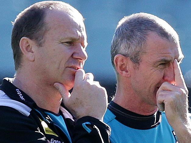 Port Adelaide training on Adelaide Ova. Ken Hinkley watches training with Phil Walsh. Photo Sarah Reed.