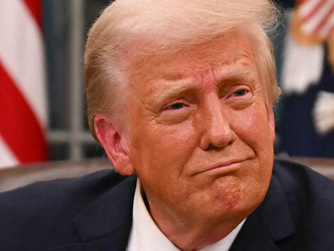 US President Donald Trump signs executive orders in the Oval Office of the White House in Washington, DC, on January 20, 2025. Picture: NewsWire / Jim WATSON / POOL / AFP