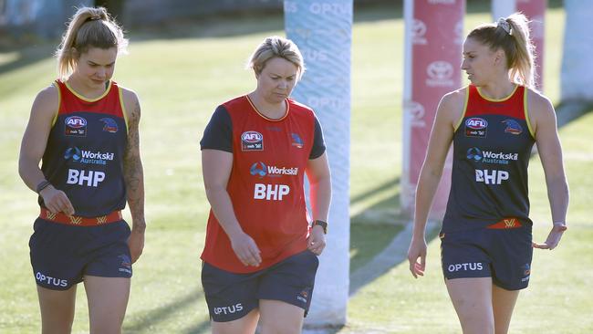 Deni Varnhagen, right, with teammates at Crows’ training on Monday. Picture: Dean Martin