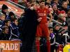 Liverpool manager Brendan Rodgers (L) gives instructions to Liverpool's English midfielder Steven Gerrard (R) on the touchline during the English Premier League football match between Liverpool and Sunderland at Anfield in Liverpool, north west England, on December 6, 2014. AFP PHOTO / PAUL ELLIS RESTRICTED TO EDITORIAL USE. No use with unauthorized audio, video, data, fixture lists, club/league logos or “live” services. Online in-match use limited to 45 images, no video emulation. No use in betting, games or single club/league/player publications.