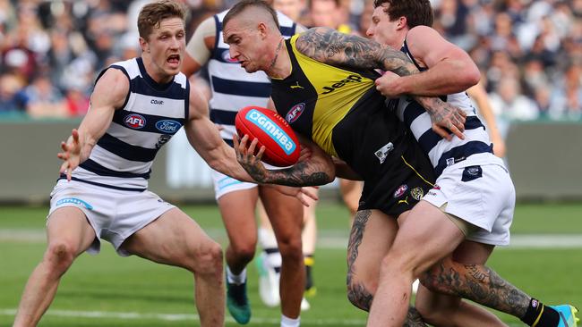 Richmond star Dustin Martin tries to break a Jed Bews tackle. Picture: Michael Klein