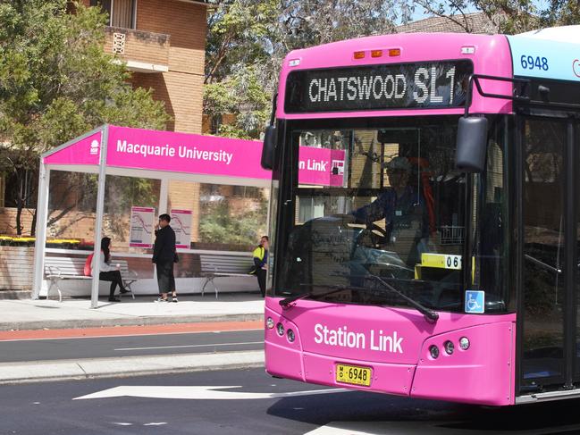 The new Station Link bus services during the Epping to Chatswood rail closure at Epping Station, Sydney, Sunday, September 30, 2018. Sydney train commuters have been inconvenienced by another IT glitch after the Epping to Chatswood rail link was shutdown overnight. (AAP Image/Ben Rushton) NO ARCHIVING