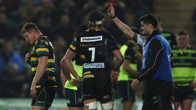 Dylan Hartley walks off the pitch after being shown the red card by referee Jerome Garces during the European Rugby Champions Cup match against Leinster.