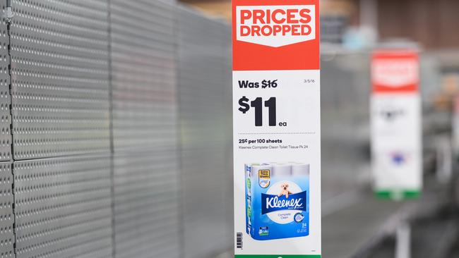 Empty shelves normally stocked with toilet paper rolls at Woolworths supermarket in Parramatta. Picture: AAP