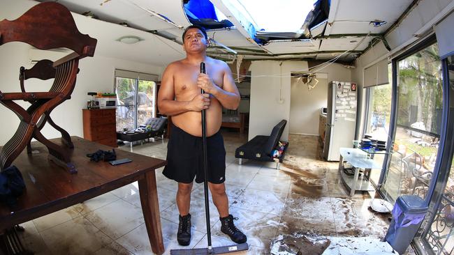 Bernie Hardiman inside his home that was severely damaged by the Christmas Day storms when the Coomera River flooded. Picture: Adam Head