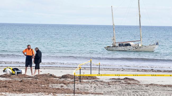 Samuel and Claude Evans at the spot where the yacht that was washed up for weeks. Picture: Tom Huntley