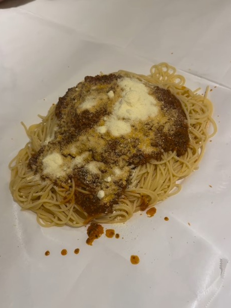 The final result got under the skin of many Italian Australians, including this one who doesn't mind the eating off the table so much as the not stirring the sauce through the pasta. Picture: Instagram: bickmorecarrie