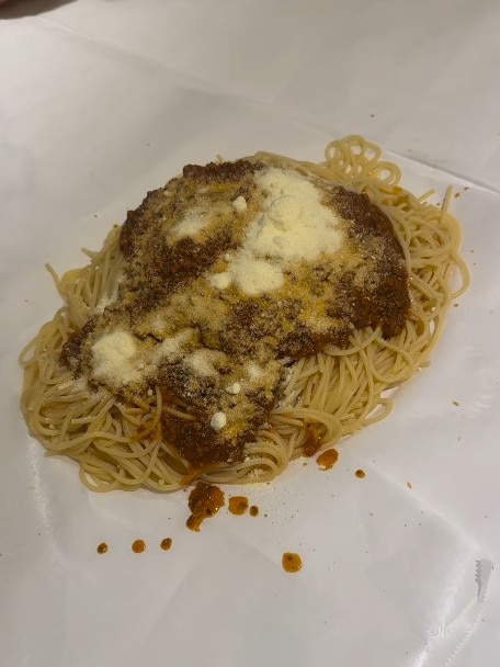 The final result got under the skin of many Italian Australians, including this one who doesn't mind the eating off the table so much as the not stirring the sauce through the pasta. Picture: Instagram: bickmorecarrie