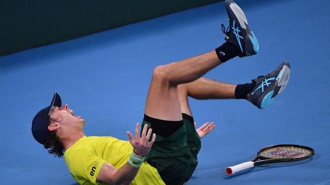 Australia’s Alex de Minaur was elated to beat Marton Fucsovics in a two-hour-plus slugfest. Picture: AFP