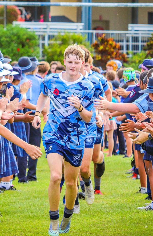 Blackheath and Thornburgh College First XIII captain Jackson Curtis running his side out at Anzac Day in 2023 wearing the special edition 2023 Anzac Day jerseys. Picture: Blackheath and Thornburgh College