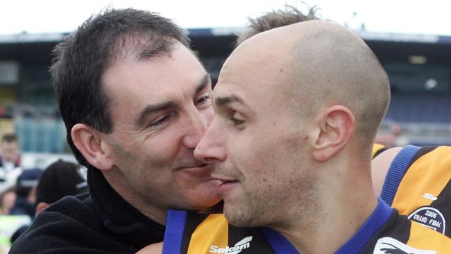 Mark Williams and Ezrya Poyas after the 2006 grand final victory over Geelong.