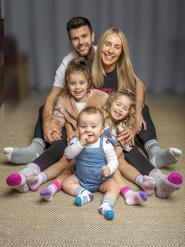 Trent and Brooke Cotchin and their three children Harper, Mackenzie and Parker 10 launch their business Posisocks. Picture: Tim Carrafa