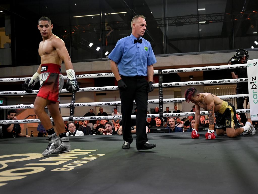 Mounir Fathi leaves Jerome Pascua keeled over in pain. Picture: No Limit Boxing