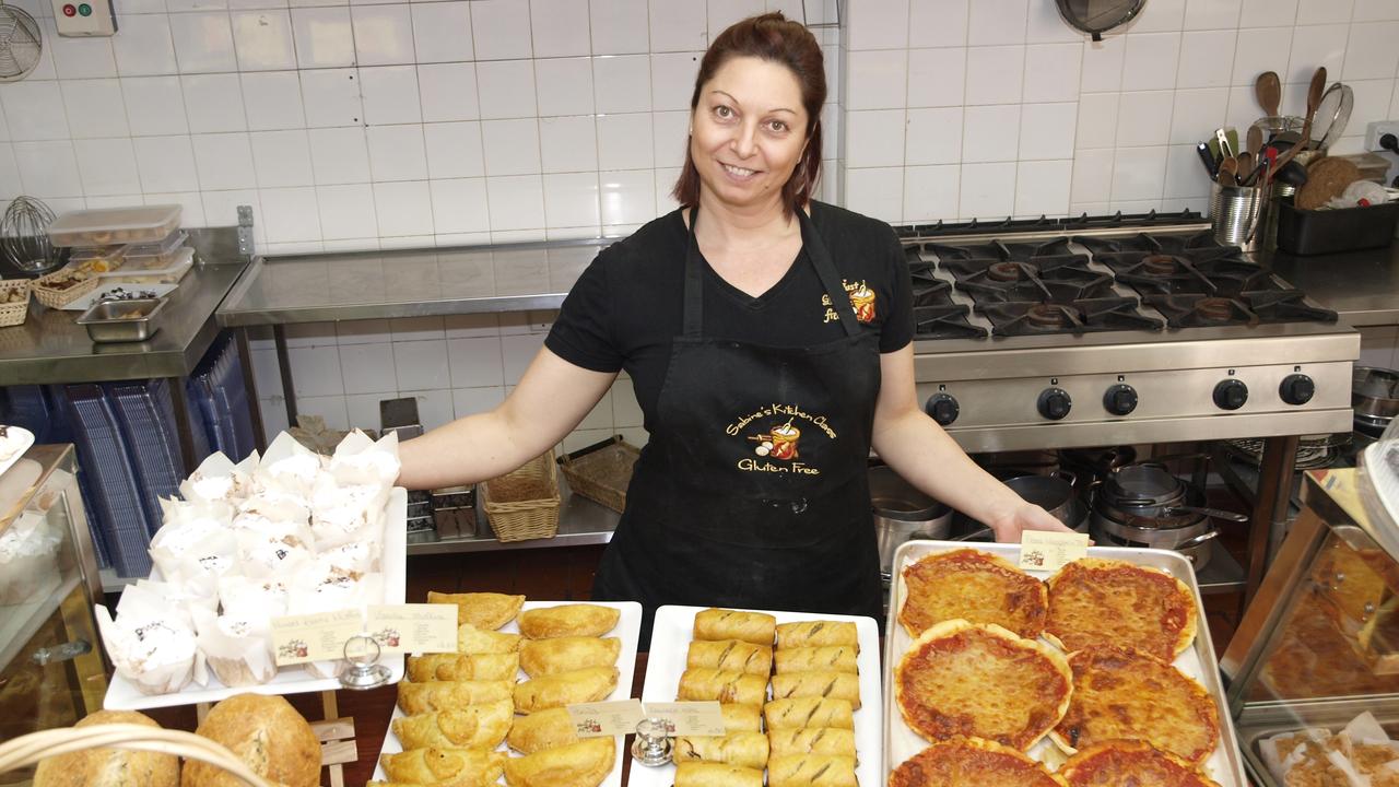 Owner of gluten-free bakery 'Just Gluten Free' Sabine De Vuono with her food. Picture: Supplied