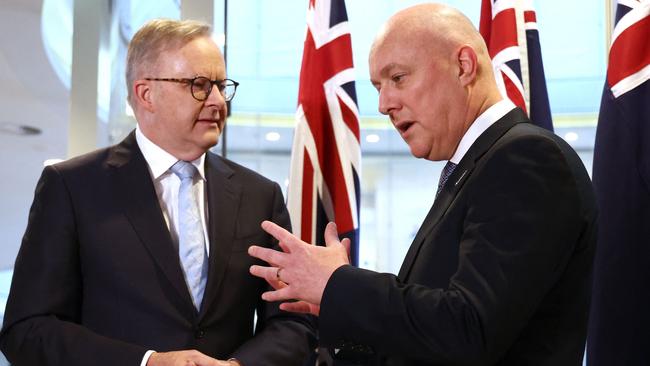 Australia's Prime Minister Anthony Albanese (L) talks with New Zealand's Prime Minister Christopher Luxon in Sydney on December 20, 2023. (Photo by DAVID GRAY / AFP)