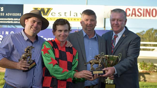 Beef Week Cup was won by Queen of Kingston at Casino Racing Club last year. Pictured are trainer Daniel Bowen, jockey Mathew McGurren, owner Stephen Butcher and Beef Week president Frank McKey.