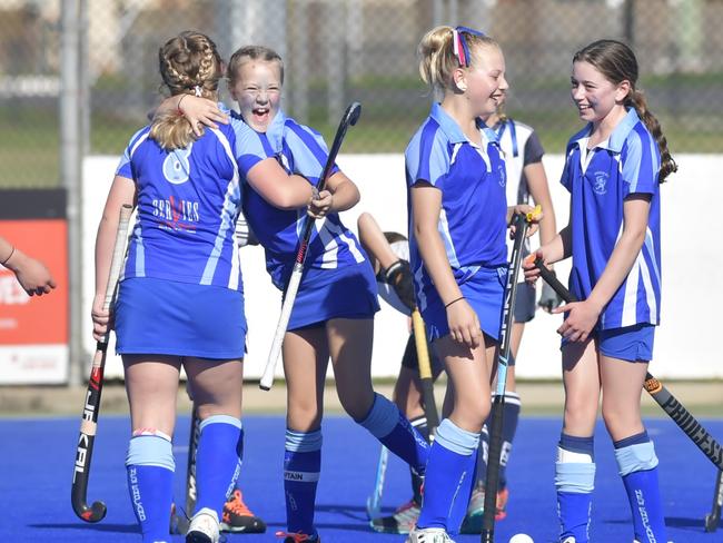 NSW under-13 girls Division 2 hockey final between Far North Coast and Hockey New England (blue) won by New England 2-0 at Grafton.