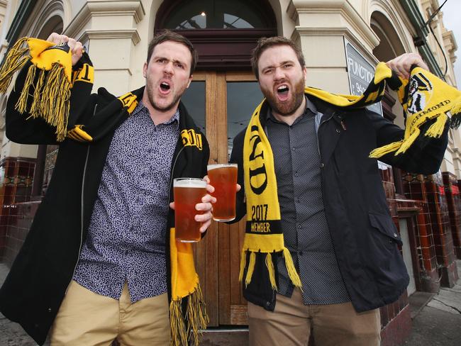 Tigers fans have a beer at the Swans Hotel. Picture: Michael Dodge, Getty Images