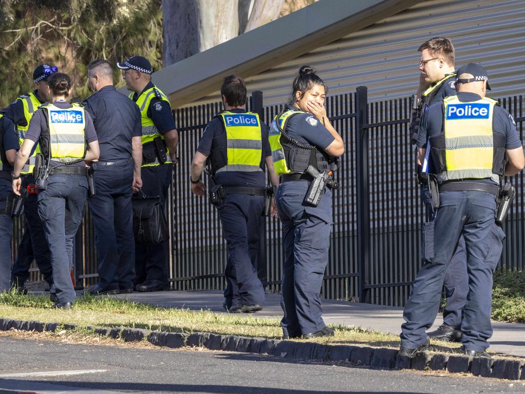 Police outside Auburn South Primary School. Picture: Wayne Taylor