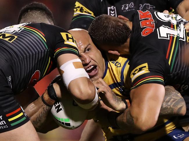 Blake Ferguson of the Eels is gang tackled. Picture: Mark Kolbe/Getty Images