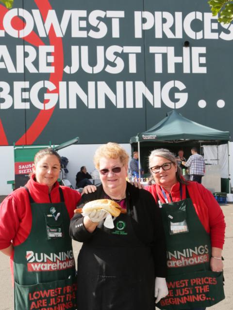 Maybe it’s the weekend Bunnings sausage sizzles? Bunnings workers Helen Dumont and Jen Clark with shopper June Young. Picture: Ian Svegovic