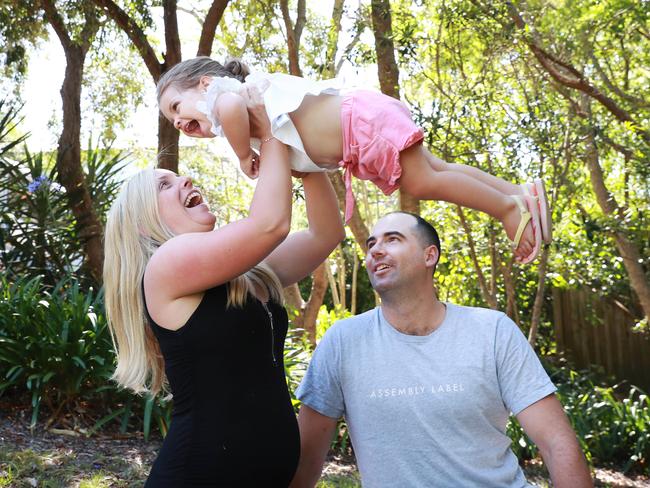 Samantha and Mitch Thompson with their daughter Emilia 20 months at their Seaforth home. Since the advent of COVID-19 private obstetricians are reporting full books already for March, April and May next year. Picture: John Feder/The Australian.