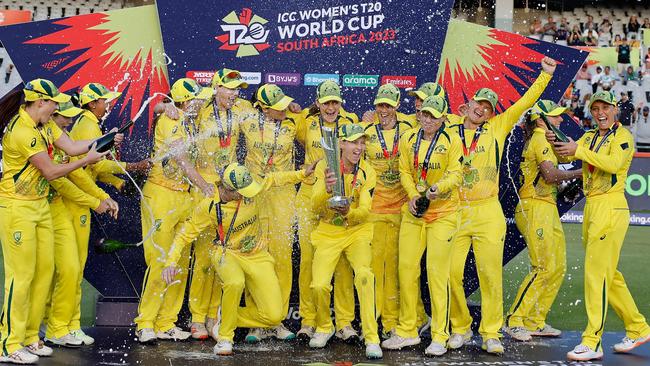 Captain Meg Lanning holds the World Cup trophy as the Australians celebrate their sixth T20 title after defeating South Africa at Newlands Stadium in Cape Town. Picture: AFP