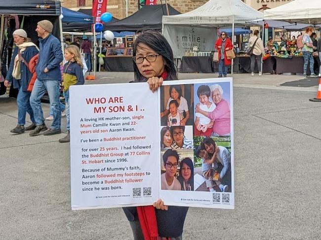 Camille Kwan protesting in Salamanca Place, Hobart.