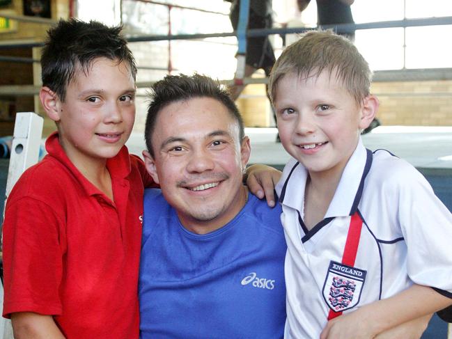 Kostya with his two boys at the gym 17 years ago.