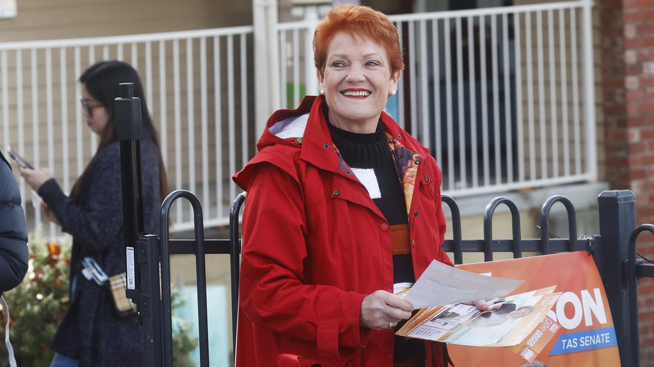 One Nation senator Pauline Hanson handing out how to vote cards for the party at Lansdowne Crescent Primary School in West Hobart. Picture: Nikki Davis-Jones