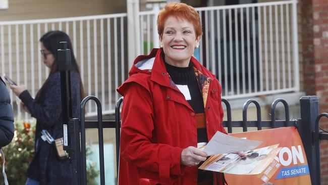 One Nation senator Pauline Hanson handing out how to vote cards for the party at Lansdowne Crescent Primary School in West Hobart. Picture: Nikki Davis-Jones