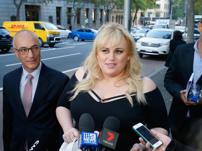 MELBOURNE, AUSTRALIA - APRIL 19:  Rebel Wilson walks out of the Court of Appeal on April 19, 2018 in Melbourne, Australia. Rebel Wilson successfully sued Women's Day magazine publisher Bauer Media in September 2017 over a series of articles she alleged portrayed her as a serial liar and cost her movie roles in Hollywood. Wilson was awarded a record $4.5 million pay out plus legal costs totalling $650,000. Bauer Media challenging the payout amount, arguing that $4.5 million is excessive and ignored Victoria's general defamation damages cap of $389,500.  (Photo by Darrian Traynor/Getty Images)