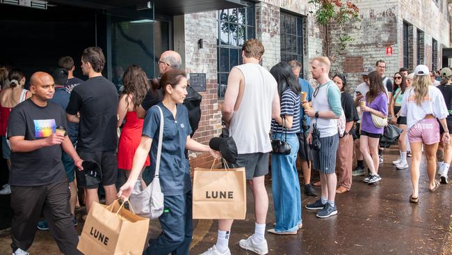 Rosebery Customers wait in extraordinary long lines to for Lune bakery opening day. Picture Thomas Lisson