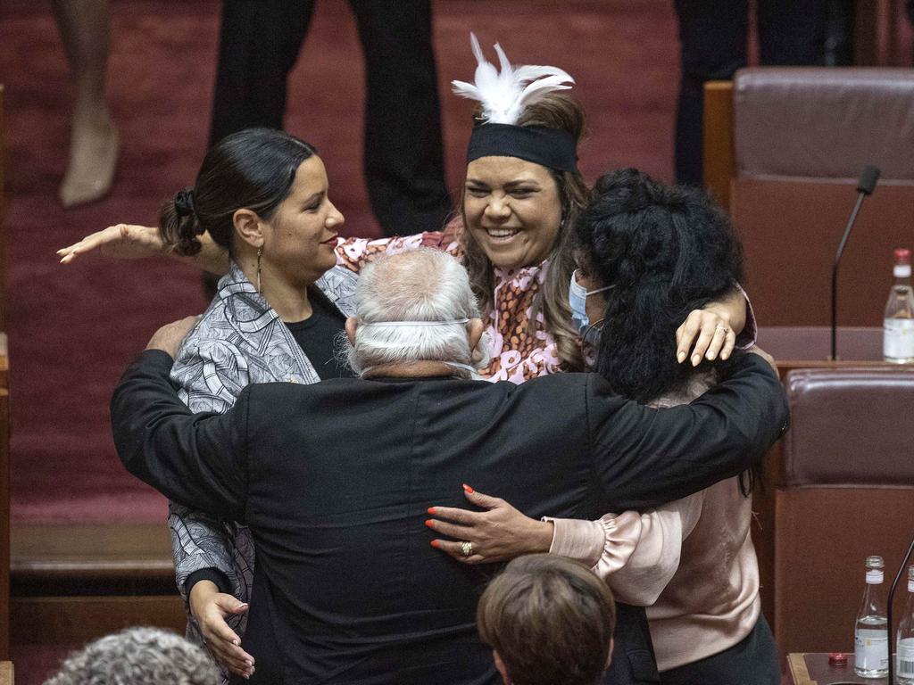 Senator Jacinta Price hugging senator Jana Stewart and other indigenous senators, Pat Dodson and Malarndirri McCarthy after she her maiden speech. Picture: NCA NewsWire / Gary Ramage