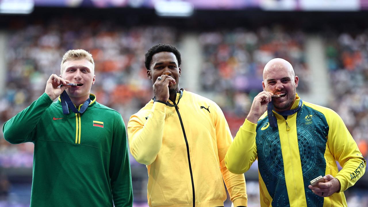 Paris Olympics men’s discus medallists (from left) Lithuania's Mykolas Alekna, Jamaica's Roje Stona and Australia's Matthew Denny. Picture: AFP