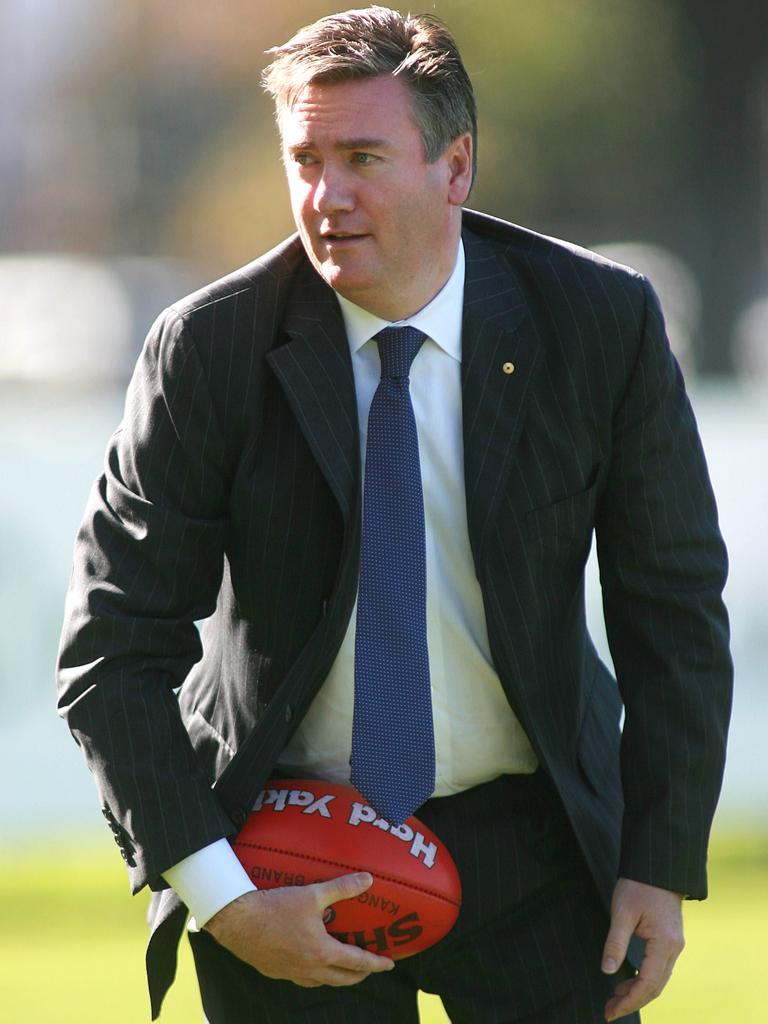 Channel Nine chief executive and Collingwood president Eddie McGuire kicks the ball around, during Collingwood AFL training at Gosch's Paddock in Melbourne, ahead of tomorrow's Anzac Day clash.