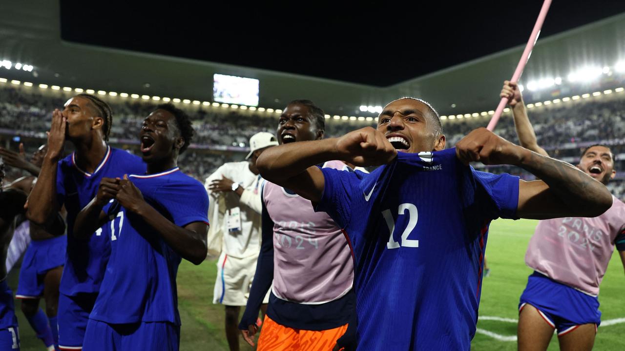 Enzo Millot and teammates celebrate the win. Picture: AFP