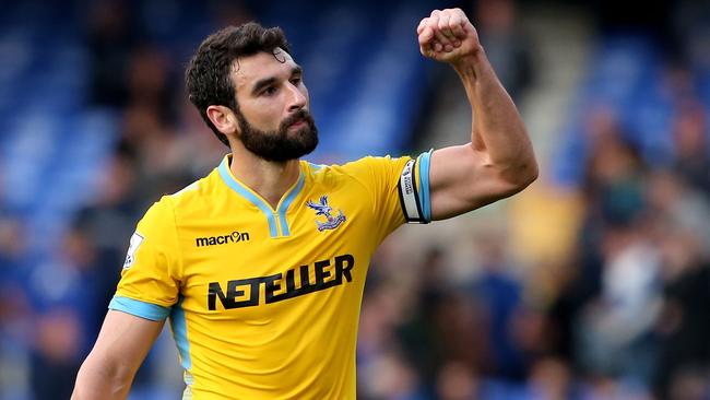 LIVERPOOL, ENGLAND - SEPTEMBER 21: Mile Jedinak (R) of Crystal Palace and his teammates applaud the travelling fans following their team's 3-2 victory during the Barclays Premier League match between Everton and Crystal Palace at Goodison Park on September 21, 2014 in Liverpool, England. (Photo by Jan Kruger/Getty Images)