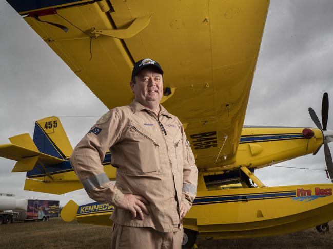 Pilot Andrew Kennedy with an Air Tractor Fire Boss. Picture: Chris Kidd