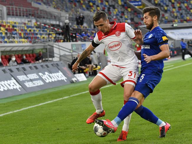 Dusseldorf versus Schalke in the German Bundesliga, the first world major league to start back up. Picture: AP