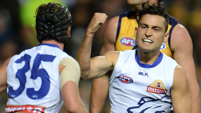 Bulldogs Luke Dahlhaus and Caleb Daniel celebrate a goal.