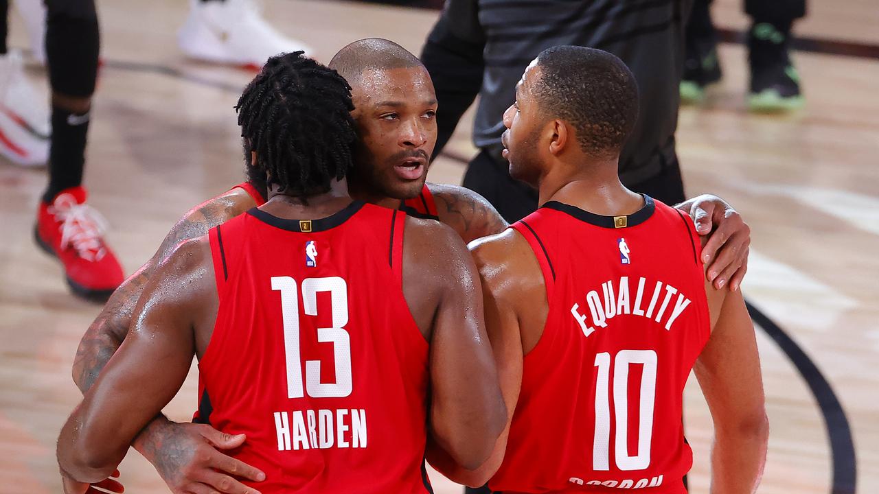 PJ Tucker (centre) is 'irate' while Eric Gordon (right) is also unhappy. (Photo by Kevin C. Cox/Getty Images)