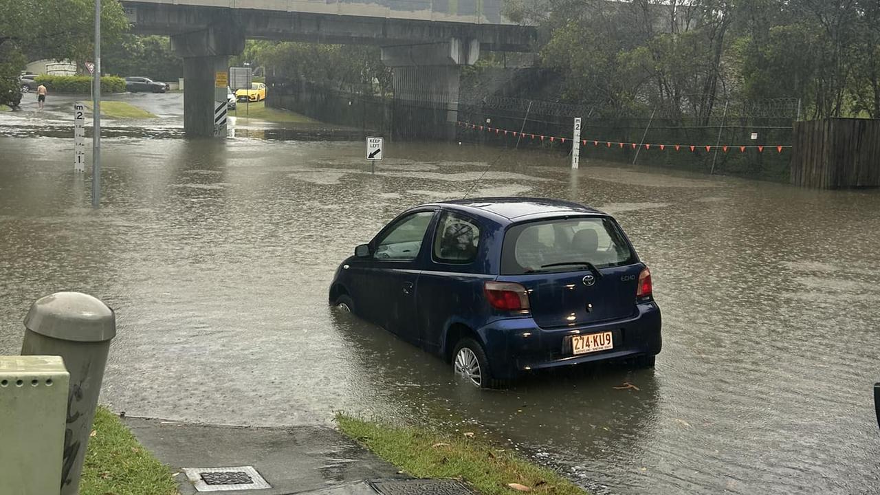 Flash flooding hits Coast suburbs as heavy falls continue