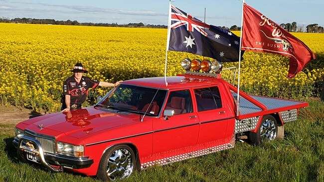 Peter Jeffrey, from Ballarat, with his Holden WB twin cab among the canola. He says: "It has history, from hauling a caravan and boat on family holidays, to now 25 years on and three restorations later."